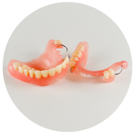 Dentist explaining Damage Dentures