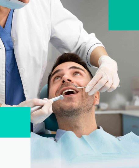 Dentist performing oral exam male patient