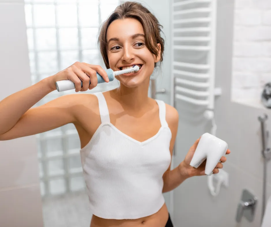 Woman brushing teeth oral hygiene