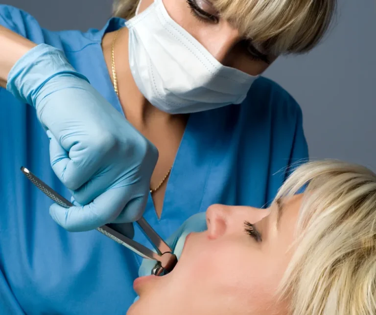 Dentist treating patient procedure