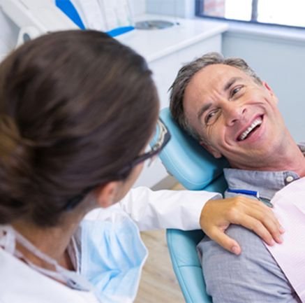 Athlete smiling after emergency dental treatment at a Wethersfield CT dental office