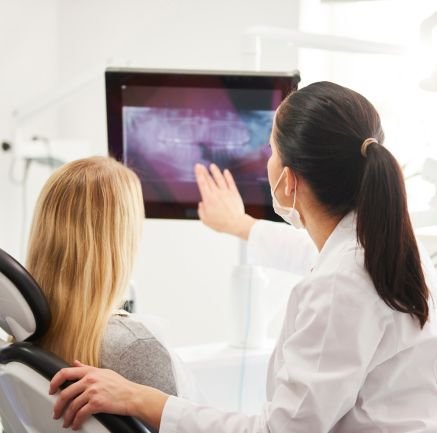 Dentist explaining dental scan in Wethersfield CT