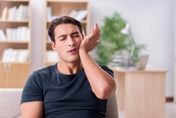 Man with tooth pain dental issue in Wethersfield CT