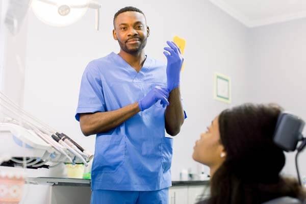 Dentist teaching oral hygiene in Wethersfield CT