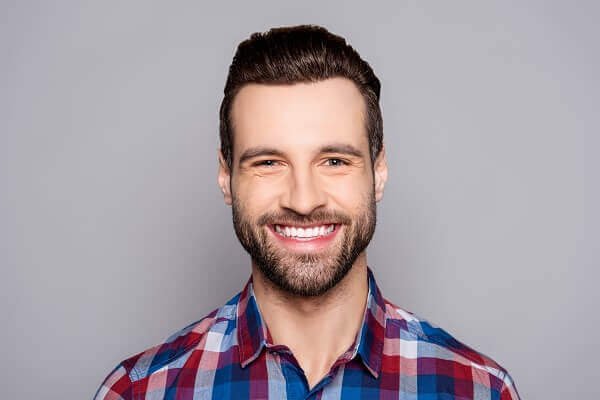 Smiling man portrait dental care